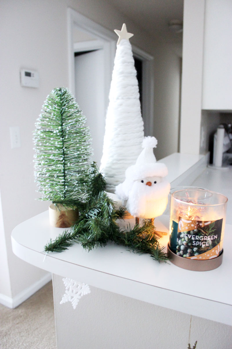 holiday-decor-farmhouse-vignette-flocked-christmas-tree-white-christmas-tree-rustic-christmas-animal-decor-christmas-candle-target